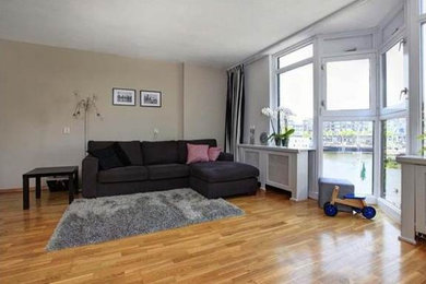 Trendy living room photo in Amsterdam