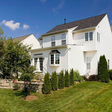 Large Kitchen Addition Opens to Patio for Enhanced Family Living