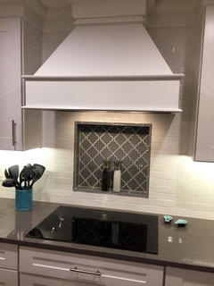 Kitchen backsplash is not symmetrical and I don't know what to do