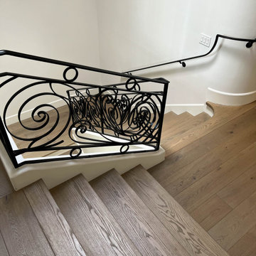 Soft-Modern Whole Home Renovation | Engineered Hardwood Stairwell