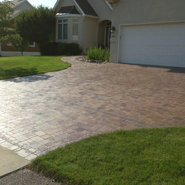 Koi Pond with Belgard paver driveway and walkway