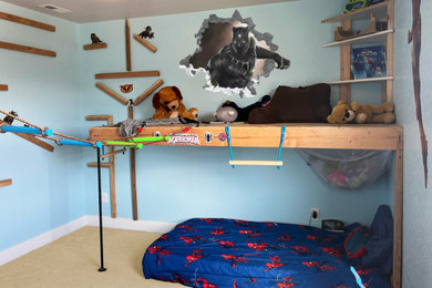 Kids' room - mid-sized contemporary boy carpeted and beige floor kids' room idea in Denver with blue walls