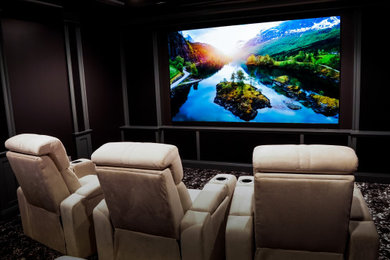 Inspiration for a mid-sized timeless home theater remodel in DC Metro