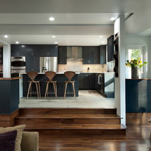 steps into kitchen