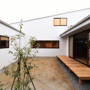 他の地域のアジアンスタイルのおしゃれなテラス・中庭 (日よけなし) の写真