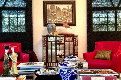 Example of an eclectic marble floor living room design in Other