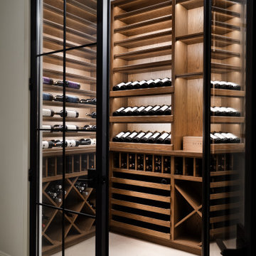 Modern Glass-Enclosed Wine Cellar with Custom Oak Racking | Chicago