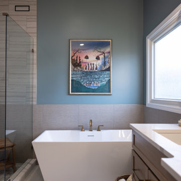 Spa Like Primary Bathroom Remodel with Warm Wood & Brass Details