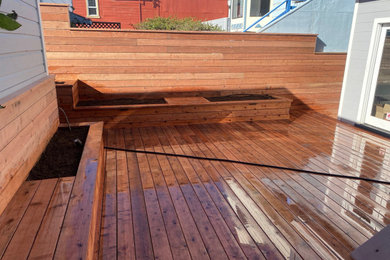 Deck - small contemporary backyard ground level deck idea in San Francisco