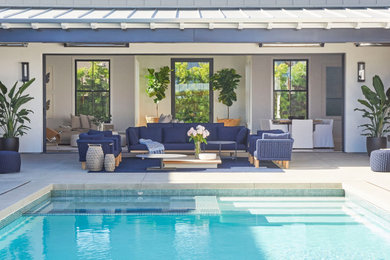 Example of a beach style home design design in San Diego