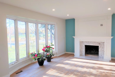 Transitional living room photo in Montreal
