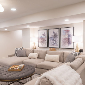 Warm & Inviting Basement Retreat with Custom Bar + Entertainment Center