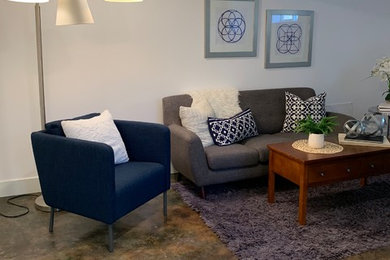 Trendy multicolored floor living room photo in Portland with white walls