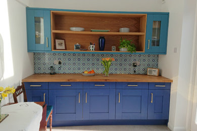 Example of a tuscan kitchen design in London