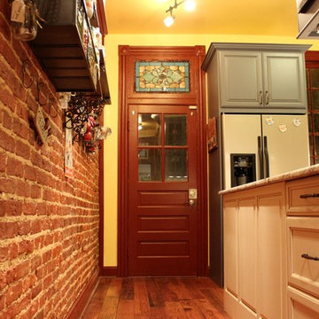 Traditional Galley Kitchen with Beige & Blue Cabinets