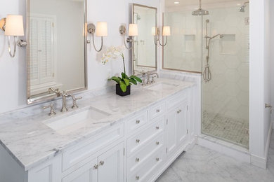 Bathroom - mid-sized transitional master linoleum floor and white floor bathroom idea in New York with white walls, an undermount sink, a hinged shower door, beaded inset cabinets, white cabinets and marble countertops