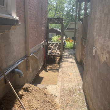 New hardscape stone paver pathway with drain installation