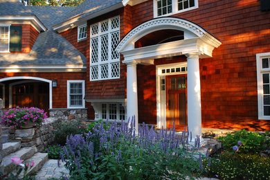 Inspiration for a mid-sized traditional shade front yard stone garden path in New York for summer.
