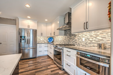Example of a transitional kitchen design in Seattle