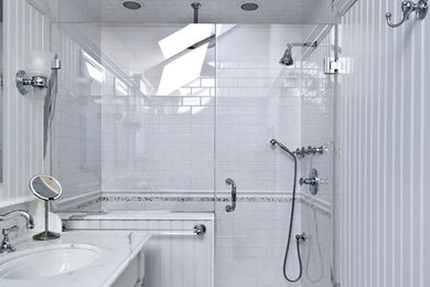 Example of a transitional bathroom design in New York