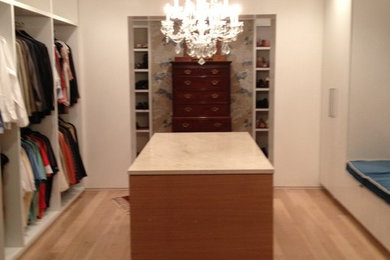 This is an example of a contemporary storage and wardrobe in New Orleans.