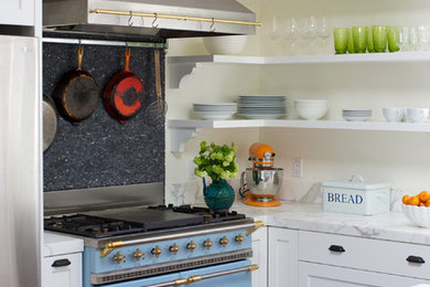 Inspiration for a mid-sized transitional l-shaped medium tone wood floor eat-in kitchen remodel in San Francisco with open cabinets, white cabinets, gray backsplash, colored appliances and marble countertops