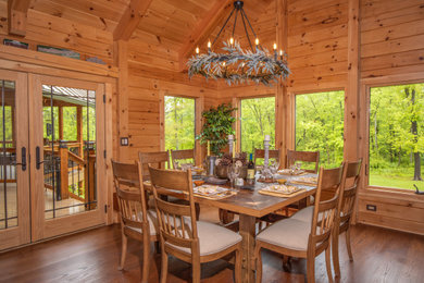 Mountain style dining room photo in Other
