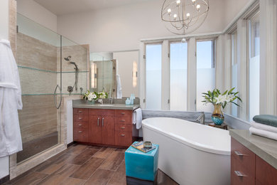 This is an example of a contemporary bathroom in Santa Barbara with a freestanding tub and an alcove shower.