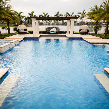 Roman/Geometric Pool with Sunshelf and Raised Spa in Davie
