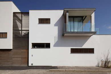Cette photo montre une façade de maison tendance.