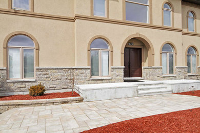 Example of a tuscan home design design in Ottawa