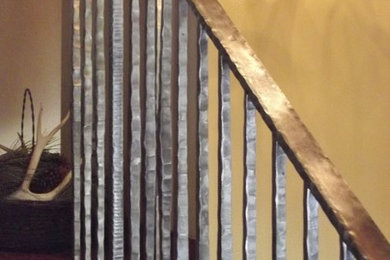 Example of an eclectic staircase design in Other