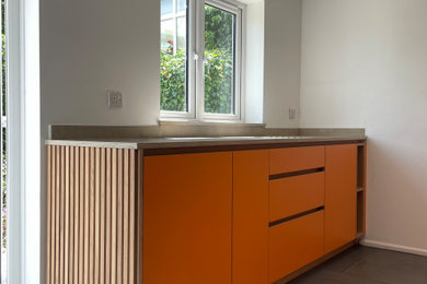 This is an example of a midcentury home in Other.