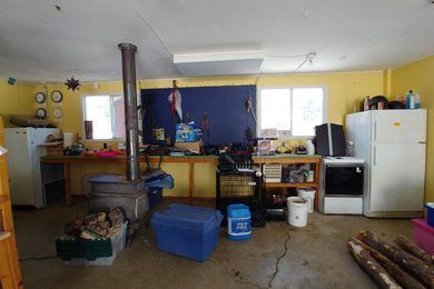 Inspiration for an industrial garage remodel in Calgary