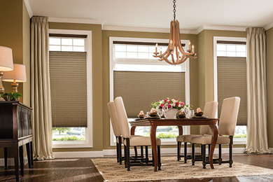 Inspiration for a mid-sized timeless dark wood floor and brown floor kitchen/dining room combo remodel in Other with brown walls and no fireplace