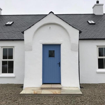 A striking blue door tied in with the rural cottage theme
