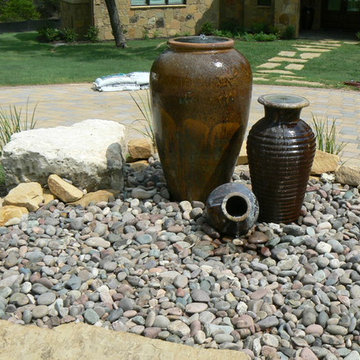 Urn Fountain Grouping in rock basin