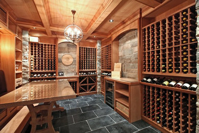 Wine cellar - traditional wine cellar idea in Toronto