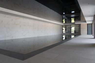 Photo of a contemporary swimming pool in Other.