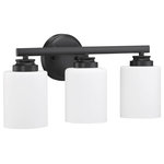 Craftmade - Bolden 3-Light Bathroom Vanity Light in Flat Black - Bold clean lines with your choice of clear seeded or white frosted glass shades complement the graceful shapes of the Bolden collection setting the stage for a look that is luxurious and effortless.  This light requires 3 , . Watt Bulbs (Not Included) UL Certified.