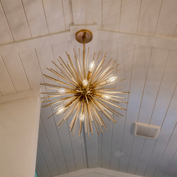 Starburst Pendant Light on Vaulted Wood Ceiling