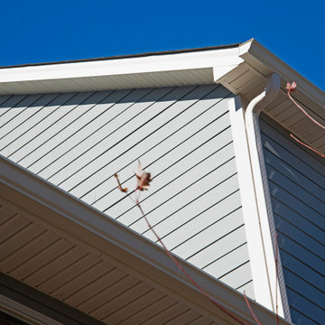 High capacity gutters and downspouts