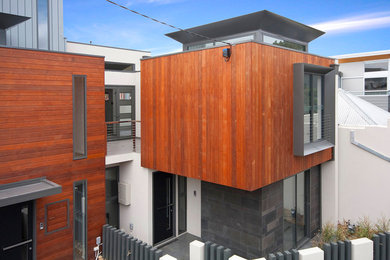 Large modern front door in Melbourne with a single front door and a gray front door.