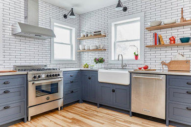 Example of a transitional kitchen design in Portland Maine