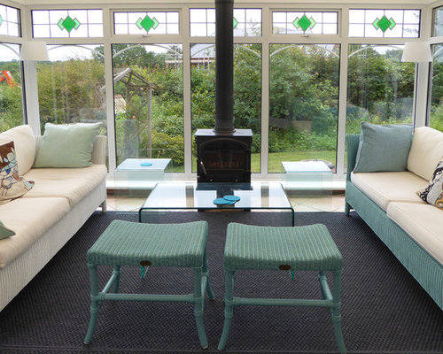 Wintergarten mit Kaminofen und Teppichboden Ideen, Design & Bilder | Houzz