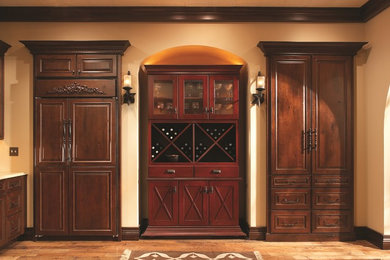 Inspiration for a large timeless medium tone wood floor wine cellar remodel in Chicago