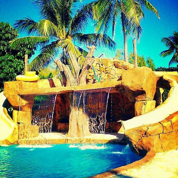 Custom Rock Waterfall with Cave and Rock Spa and Slide