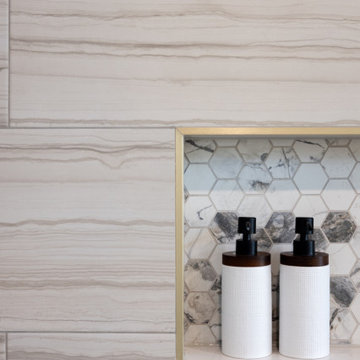 Spa Like Primary Bathroom Remodel with Warm Wood & Brass Details
