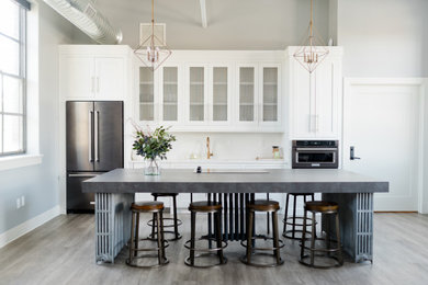 Inspiration for a mid-sized contemporary enclosed laminate floor and gray floor living room remodel with gray walls
