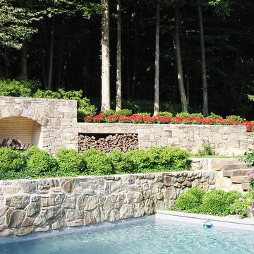 Pool Stone Hearth and Surrounding Gardens